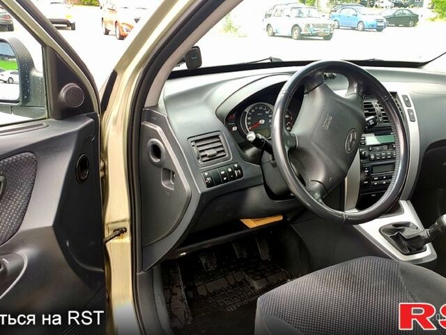 Серый Хендай Туксон, объемом двигателя 2 л и пробегом 249 тыс. км за 7300 $, фото 8 на Automoto.ua