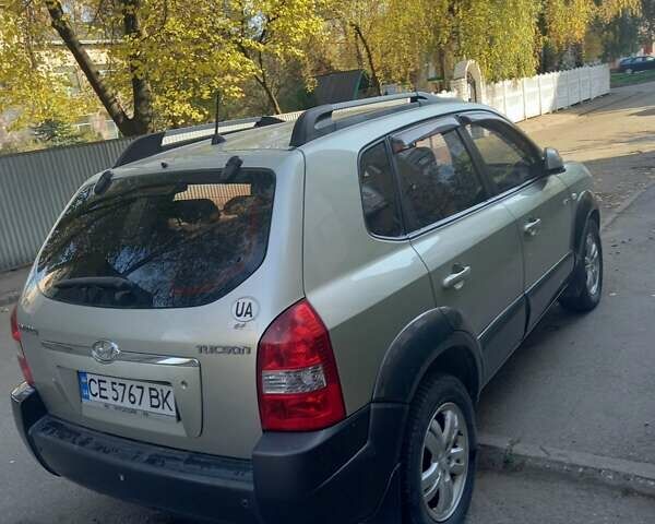 Сірий Хендай Туксон, об'ємом двигуна 2 л та пробігом 151 тис. км за 7700 $, фото 4 на Automoto.ua