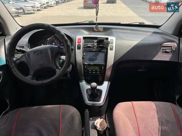 Серый Хендай Туксон, объемом двигателя 2 л и пробегом 255 тыс. км за 7490 $, фото 23 на Automoto.ua