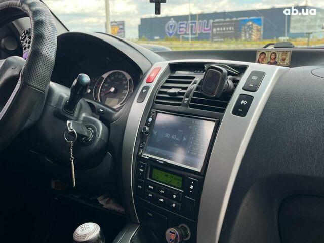 Серый Хендай Туксон, объемом двигателя 2 л и пробегом 255 тыс. км за 7490 $, фото 14 на Automoto.ua