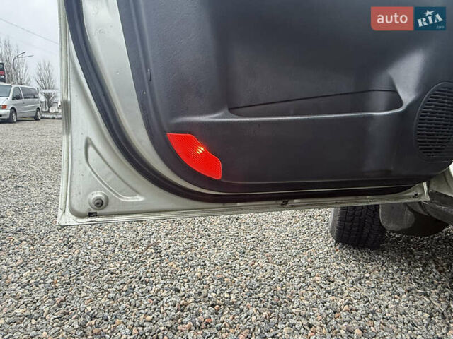 Сірий Хендай Туксон, об'ємом двигуна 1.98 л та пробігом 169 тис. км за 7890 $, фото 25 на Automoto.ua