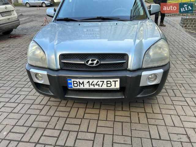 Серый Хендай Туксон, объемом двигателя 1.98 л и пробегом 269 тыс. км за 7500 $, фото 14 на Automoto.ua