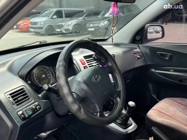 Серый Хендай Туксон, объемом двигателя 2 л и пробегом 255 тыс. км за 7490 $, фото 37 на Automoto.ua