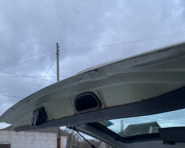 Серый Хендай Туксон, объемом двигателя 2 л и пробегом 213 тыс. км за 7999 $, фото 9 на Automoto.ua