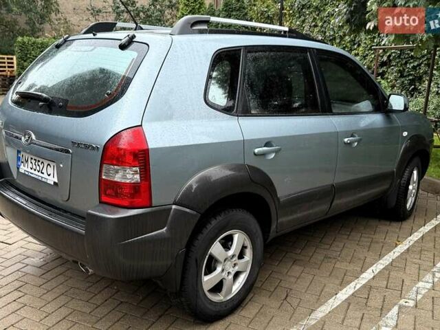 Серый Хендай Туксон, объемом двигателя 1.98 л и пробегом 218 тыс. км за 7900 $, фото 6 на Automoto.ua