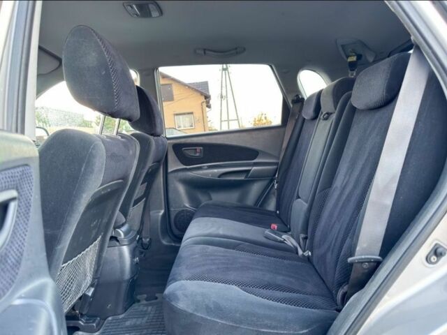 Серый Хендай Туксон, объемом двигателя 2 л и пробегом 262 тыс. км за 3750 $, фото 7 на Automoto.ua