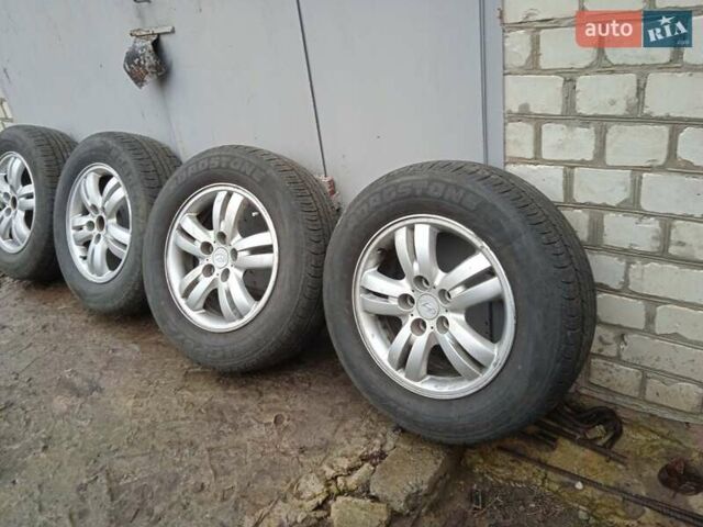 Сірий Хендай Туксон, об'ємом двигуна 1.98 л та пробігом 157 тис. км за 7800 $, фото 39 на Automoto.ua