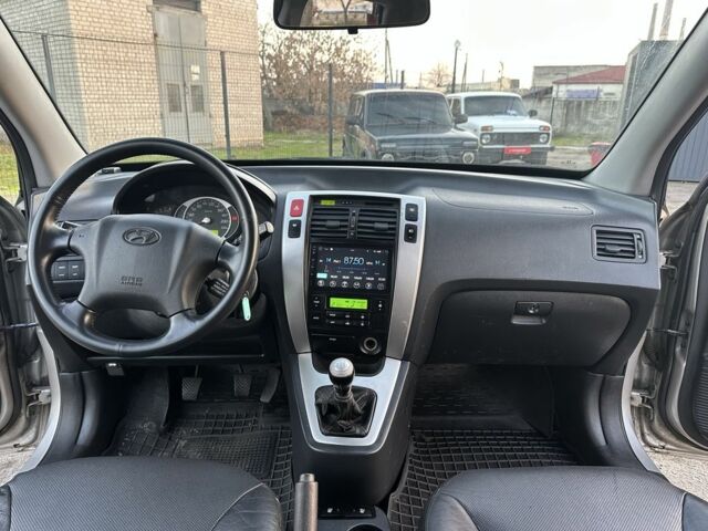 Серый Хендай Туксон, объемом двигателя 2 л и пробегом 167 тыс. км за 7299 $, фото 12 на Automoto.ua