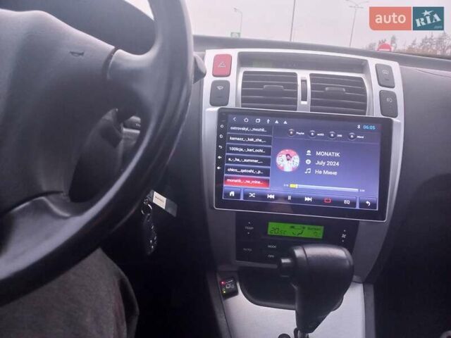 Сірий Хендай Туксон, об'ємом двигуна 2 л та пробігом 190 тис. км за 8600 $, фото 19 на Automoto.ua