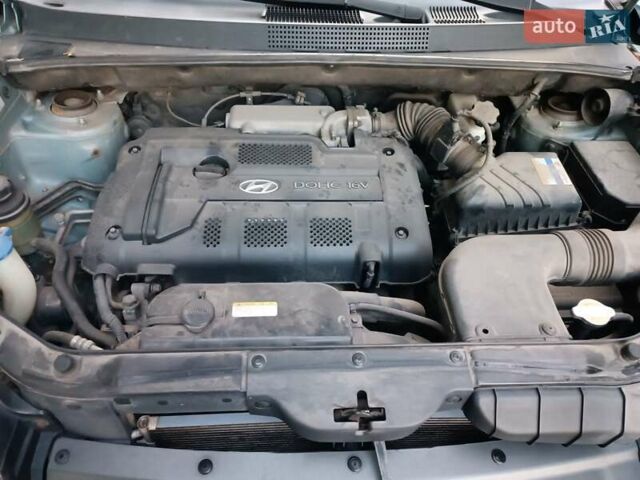 Сірий Хендай Туксон, об'ємом двигуна 1.98 л та пробігом 160 тис. км за 9000 $, фото 6 на Automoto.ua