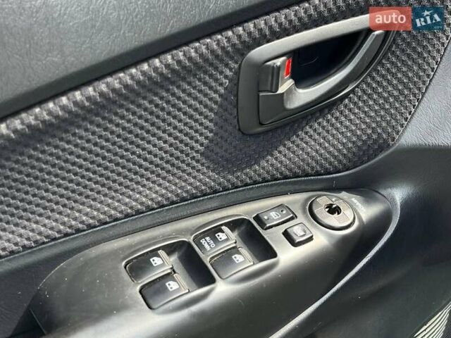 Серый Хендай Туксон, объемом двигателя 2 л и пробегом 255 тыс. км за 7490 $, фото 34 на Automoto.ua