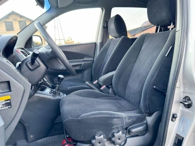 Сірий Хендай Туксон, об'ємом двигуна 2 л та пробігом 233 тис. км за 2350 $, фото 7 на Automoto.ua