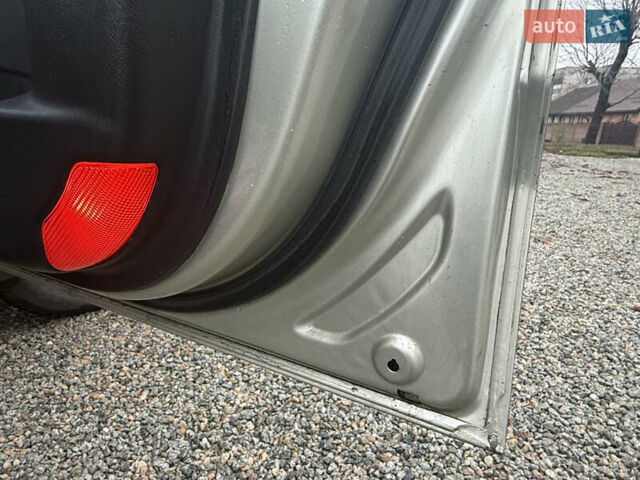 Сірий Хендай Туксон, об'ємом двигуна 1.98 л та пробігом 169 тис. км за 7890 $, фото 22 на Automoto.ua