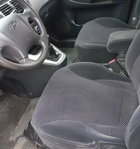 Сірий Хендай Туксон, об'ємом двигуна 2 л та пробігом 203 тис. км за 7700 $, фото 13 на Automoto.ua