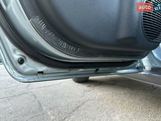Серый Хендай Туксон, объемом двигателя 2 л и пробегом 110 тыс. км за 10200 $, фото 39 на Automoto.ua