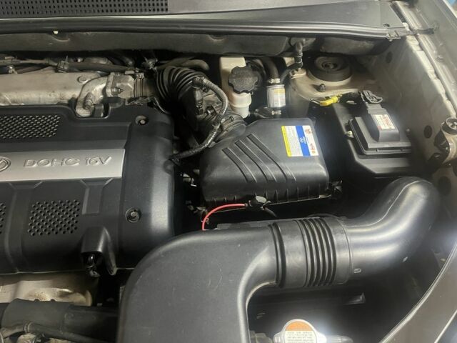 Серый Хендай Туксон, объемом двигателя 2 л и пробегом 152 тыс. км за 10000 $, фото 1 на Automoto.ua