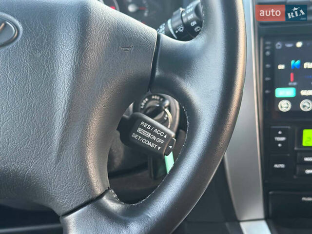 Серый Хендай Туксон, объемом двигателя 1.98 л и пробегом 167 тыс. км за 7300 $, фото 32 на Automoto.ua