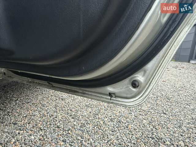 Сірий Хендай Туксон, об'ємом двигуна 1.98 л та пробігом 169 тис. км за 7890 $, фото 23 на Automoto.ua