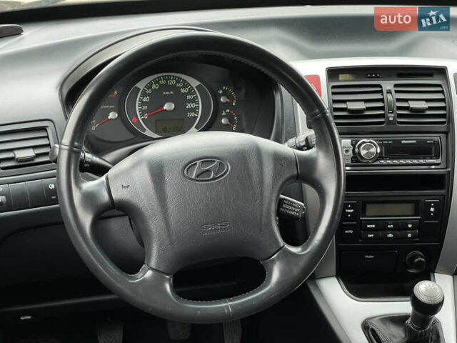 Серый Хендай Туксон, объемом двигателя 2 л и пробегом 182 тыс. км за 7600 $, фото 22 на Automoto.ua
