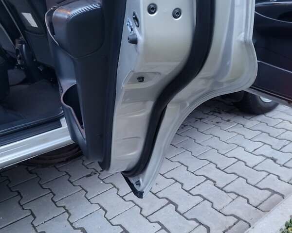 Серый Хендай Туксон, объемом двигателя 2 л и пробегом 240 тыс. км за 8300 $, фото 131 на Automoto.ua