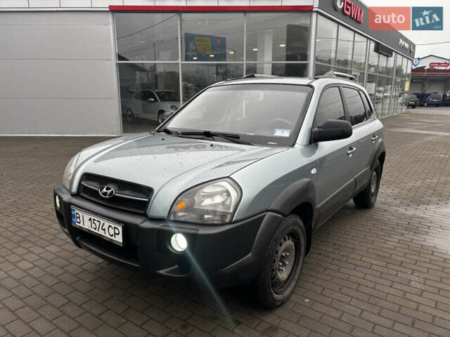 Сірий Хендай Туксон, об'ємом двигуна 2 л та пробігом 255 тис. км за 7600 $, фото 1 на Automoto.ua