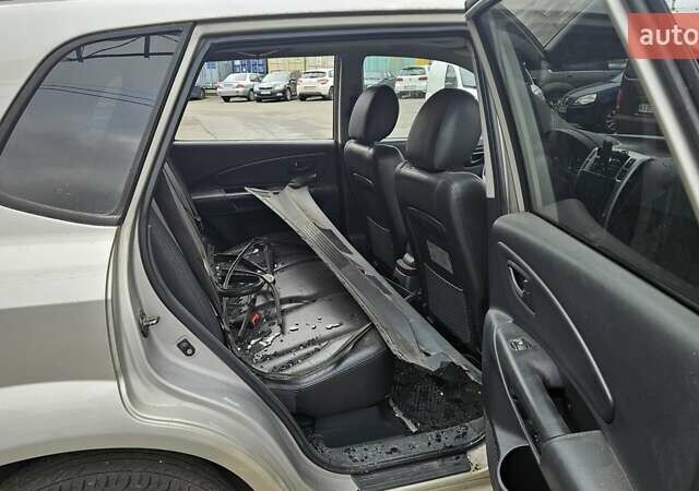 Серый Хендай Туксон, объемом двигателя 2 л и пробегом 330 тыс. км за 4000 $, фото 11 на Automoto.ua