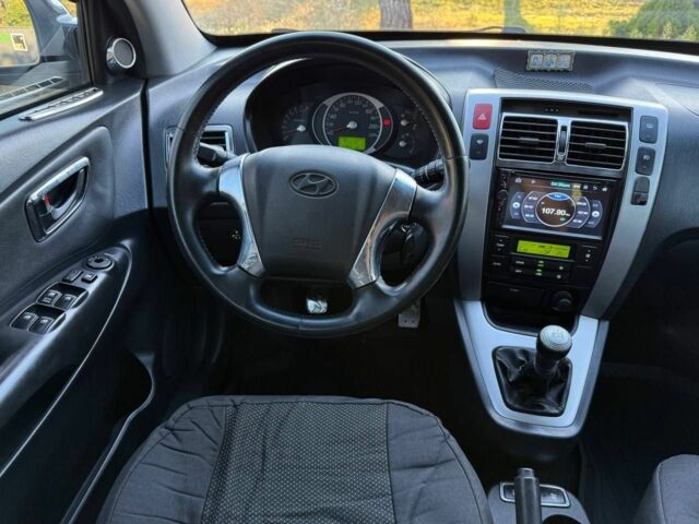 Серый Хендай Туксон, объемом двигателя 2 л и пробегом 282 тыс. км за 7950 $, фото 12 на Automoto.ua