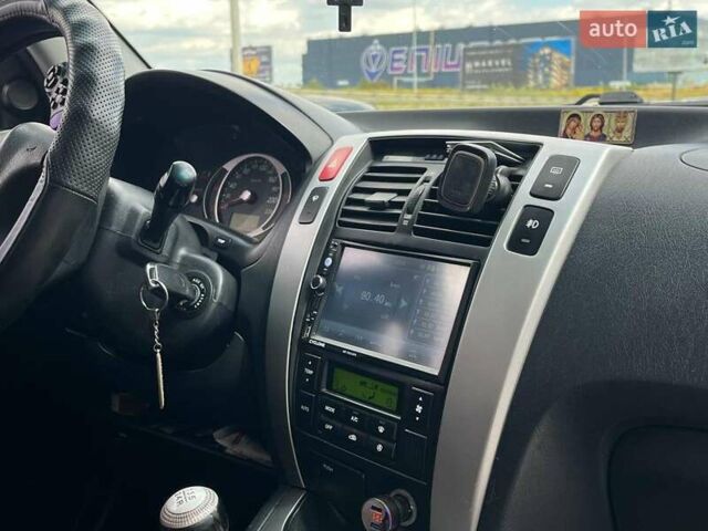 Серый Хендай Туксон, объемом двигателя 2 л и пробегом 255 тыс. км за 7490 $, фото 14 на Automoto.ua