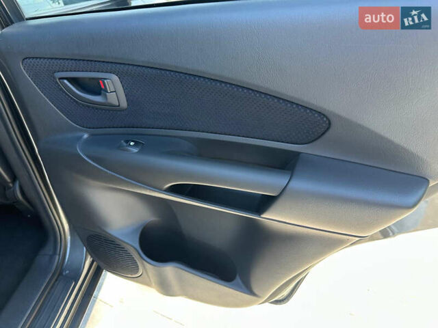 Сірий Хендай Туксон, об'ємом двигуна 1.98 л та пробігом 169 тис. км за 7300 $, фото 22 на Automoto.ua