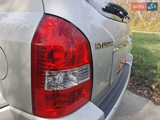 Серый Хендай Туксон, объемом двигателя 1.98 л и пробегом 173 тыс. км за 7450 $, фото 19 на Automoto.ua