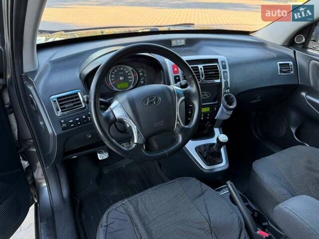 Серый Хендай Туксон, объемом двигателя 1.98 л и пробегом 282 тыс. км за 8350 $, фото 22 на Automoto.ua