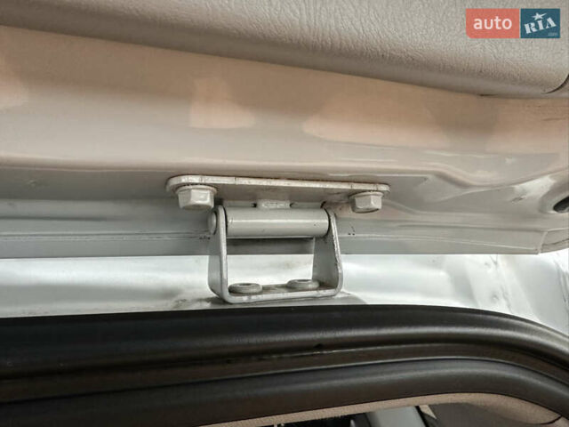 Серый Хендай Туксон, объемом двигателя 1.98 л и пробегом 217 тыс. км за 8500 $, фото 37 на Automoto.ua