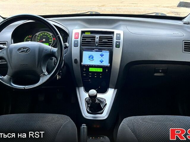 Сірий Хендай Туксон, об'ємом двигуна 2 л та пробігом 281 тис. км за 7200 $, фото 9 на Automoto.ua