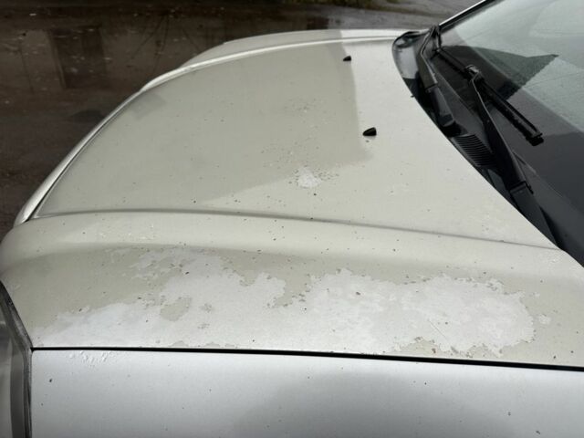 Серый Хендай Туксон, объемом двигателя 2 л и пробегом 350 тыс. км за 3850 $, фото 8 на Automoto.ua