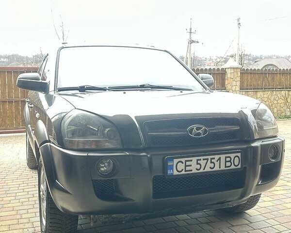 Сірий Хендай Туксон, об'ємом двигуна 2 л та пробігом 230 тис. км за 8400 $, фото 7 на Automoto.ua