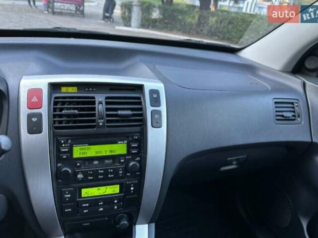 Серый Хендай Туксон, объемом двигателя 2 л и пробегом 110 тыс. км за 10200 $, фото 16 на Automoto.ua