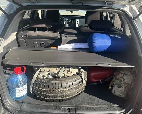 Серый Хендай Туксон, объемом двигателя 2 л и пробегом 161 тыс. км за 7000 $, фото 10 на Automoto.ua