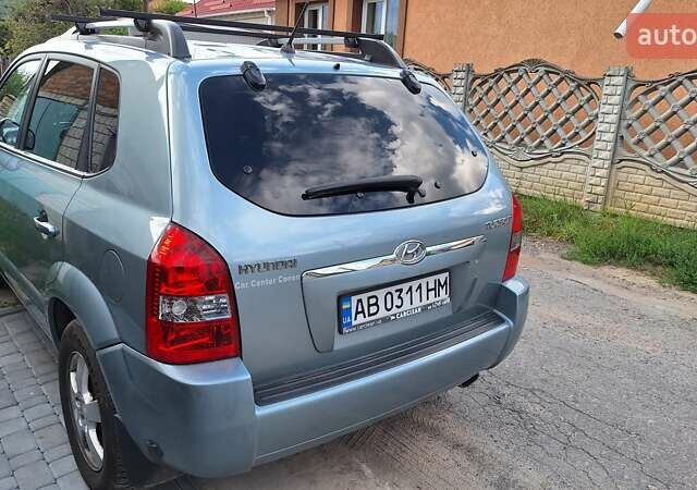 Серый Хендай Туксон, объемом двигателя 1.98 л и пробегом 177 тыс. км за 7900 $, фото 6 на Automoto.ua