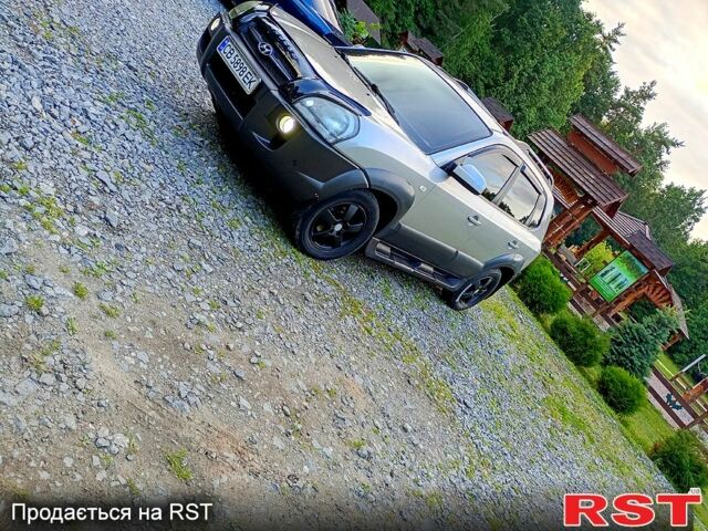 Сірий Хендай Туксон, об'ємом двигуна 2 л та пробігом 300 тис. км за 7500 $, фото 1 на Automoto.ua