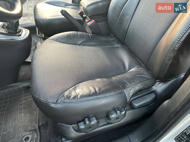 Серый Хендай Туксон, объемом двигателя 1.98 л и пробегом 167 тыс. км за 7300 $, фото 15 на Automoto.ua