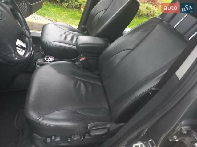 Сірий Хендай Туксон, об'ємом двигуна 2 л та пробігом 190 тис. км за 8600 $, фото 57 на Automoto.ua