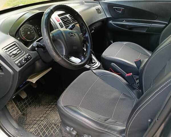 Сірий Хендай Туксон, об'ємом двигуна 1.98 л та пробігом 325 тис. км за 7800 $, фото 5 на Automoto.ua