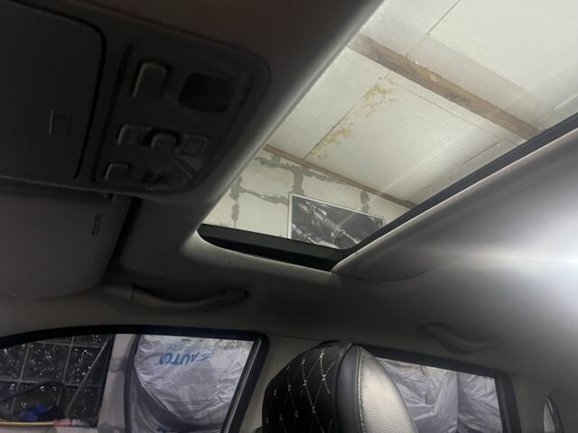 Серый Хендай Туксон, объемом двигателя 2 л и пробегом 152 тыс. км за 10000 $, фото 5 на Automoto.ua