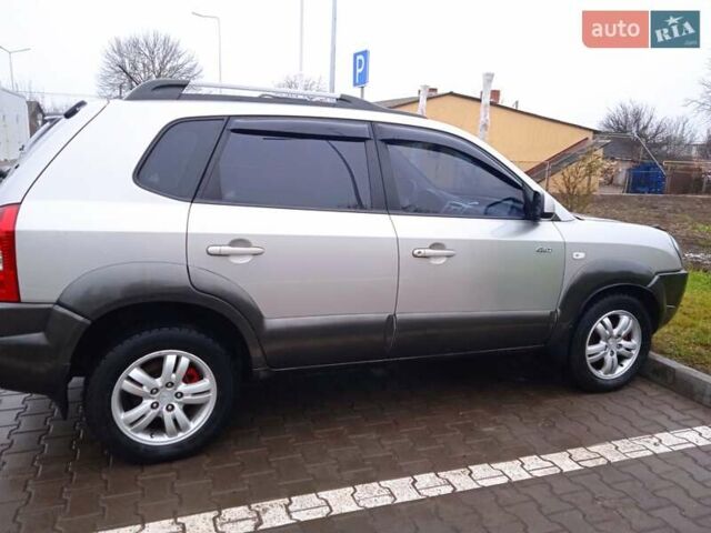 Сірий Хендай Туксон, об'ємом двигуна 1.98 л та пробігом 157 тис. км за 7800 $, фото 6 на Automoto.ua