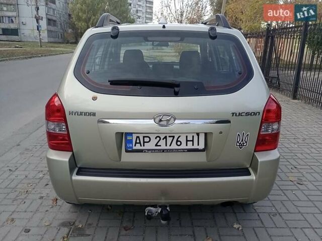 Сірий Хендай Туксон, об'ємом двигуна 1.98 л та пробігом 225 тис. км за 6999 $, фото 12 на Automoto.ua