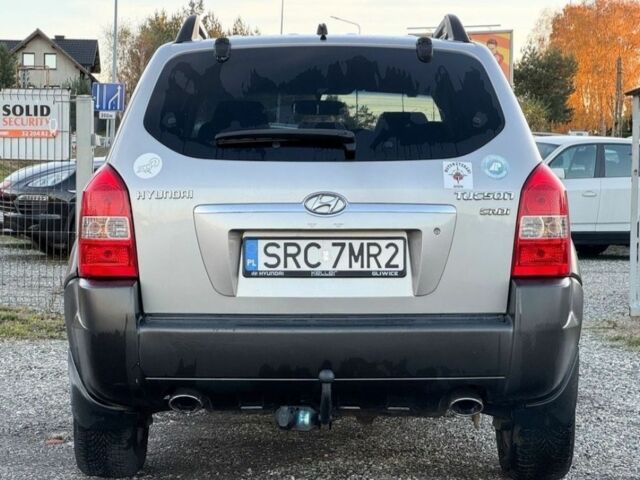Серый Хендай Туксон, объемом двигателя 2 л и пробегом 262 тыс. км за 3750 $, фото 4 на Automoto.ua