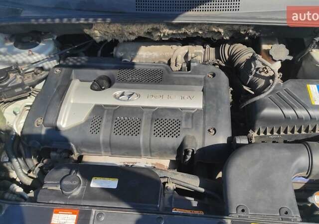 Серый Хендай Туксон, объемом двигателя 2 л и пробегом 185 тыс. км за 7999 $, фото 32 на Automoto.ua