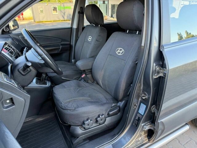 Серый Хендай Туксон, объемом двигателя 2 л и пробегом 282 тыс. км за 7950 $, фото 18 на Automoto.ua