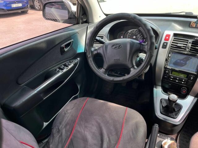 Серый Хендай Туксон, объемом двигателя 2 л и пробегом 255 тыс. км за 7490 $, фото 21 на Automoto.ua