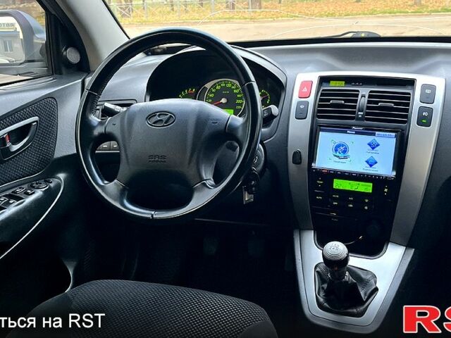 Сірий Хендай Туксон, об'ємом двигуна 2 л та пробігом 281 тис. км за 7200 $, фото 11 на Automoto.ua